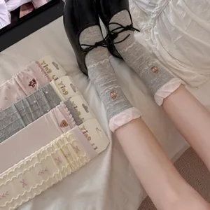 Women cute bear embroidered mid-tube socks with ruffles and bows for sweet daily wear.