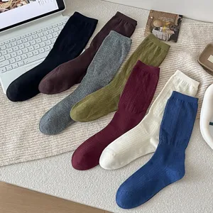 Vintage knit mid-calf socks with wheat texture, cozy retro style casual footwear detail view.