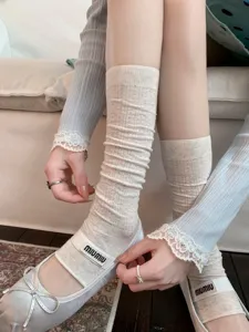 Detailed view of white ballet style stacked socks featuring breathable mesh and comfortable fit.