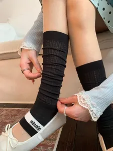 Ballet style women black mesh mid-calf slouch socks detail view, breathable summer daily wear.