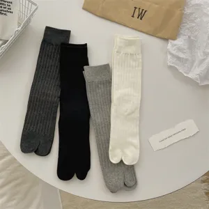 Ribbed split-toe socks in four versatile colors, comfortable mid-calf daily knit hosiery.