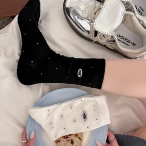 Korean style polka dot mid-calf socks featuring cute letter embroidery and soft cotton fabric for daily wear