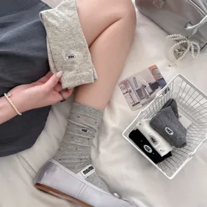 Korean style cute egg embroidered polka dot mid-calf socks for women, spring casual style.