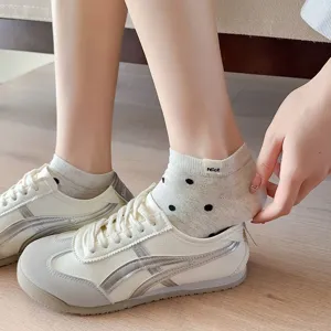 Comfortable women's short boat socks with cute polka dots and nice label, breathable cotton.