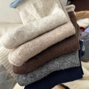 Cozy thick wool blend crew socks in neutral colors, ideal for winter warmth and daily wear.