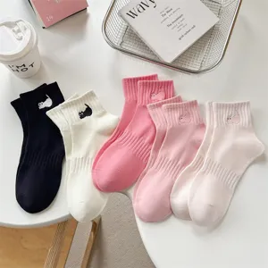 Cute embroidered cat short socks detail shot, soft cotton material, casual daily wear aesthetic.