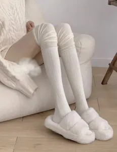Cozy white over-the-knee stack socks detail shot, soft cotton comfy daily wear loungewear.
