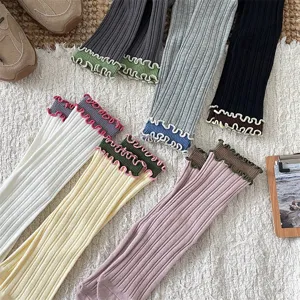 Cute vintage contrast color ruffle cuff mid-tube socks, soft cotton ribbed knit daily wear.