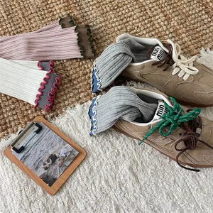 Cute ruffled mid-calf socks for women, retro contrast color design, sweet Japanese style daily wear.
