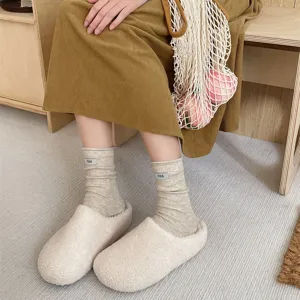 Japanese style rolled edge slouch socks for women, soft solid color cotton wool mid tube socks.
