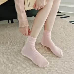 Pink short socks for women featuring cute cat embroidery, perfect for casual daily wear.