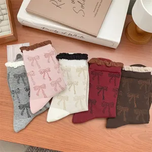 Korean style cute bow pattern mid-calf socks with contrast color ruffle cuffs for women cozy daily wear.