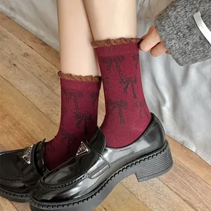 Korean vintage bow mid-calf socks, retro contrast ruffle trim design for autumn daily wear.