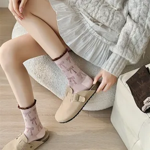 Detailed shot of cute bow printed mid-tube socks with contrast bubble cuffs, cozy lifestyle.