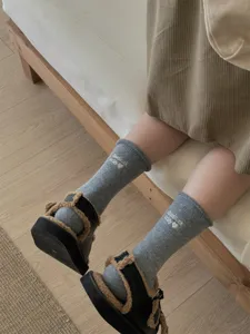 Cozy grey wool knit crew socks with cute letter embroidery, warm and soft winter hosiery.