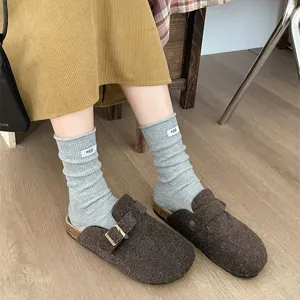 Grey ribbed knit crew socks with cute egg label, soft wool blend winter cozy fashion hosiery.