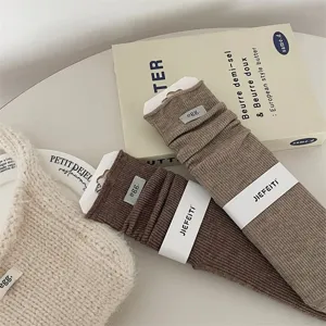Japanese style rolled cuff slouch socks detail, solid color wool blend cozy long hosiery.
