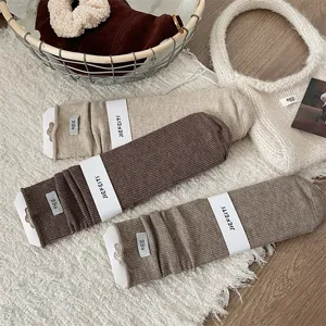 Japanese style solid color slouch socks for women, soft knitted ribbed long winter socks.