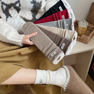 Cozy ribbed slouch socks for women, soft solid color cotton long socks for autumn and winter.