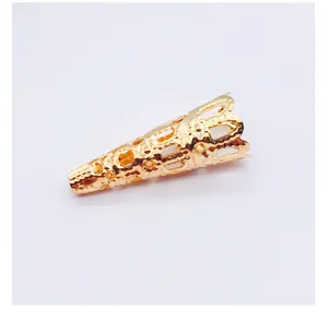 Close-up of the vintage gold plated hollow trumpet metal bead cap diy jewelry accessory detail.