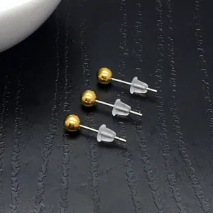 Gold Kugel Ohrstecker mit klaren Kunststoff Stoßfängern, minimalistische Schmuck Accessoires.