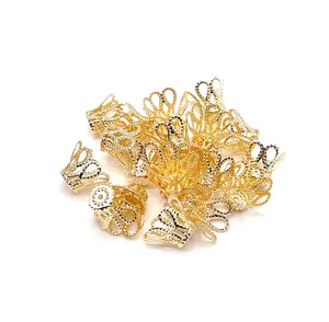 Gold tone filigree bead caps metal findings for DIY handmade jewelry crafts design.