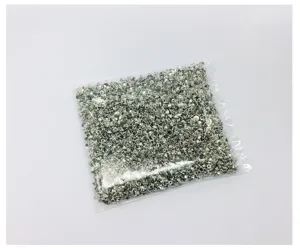 Detail shot of silver metal eye pins in a transparent bag, ideal for DIY jewelry crafting.