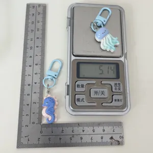 Cute marine animal keychain, jellyfish and seahorse pendant, student bag accessory gift.