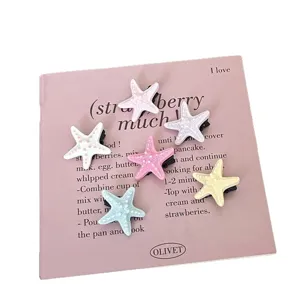 Cute starfish hair clips set for women and girls, sweet resin duckbill clips for beach vacation.