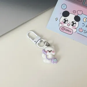 Simpatico portachiavi cucciolo bianco cartone animato ciondolo zaino accessorio per le ragazze.