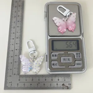 Spring transparent butterfly keychain floral jelly cute bag charm for girls and couples.