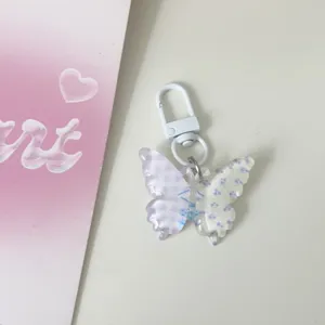 Spring translucent butterfly keychain with floral jelly clear pendant for bag accessories.