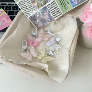 Cute jelly butterfly keychain with floral patterns, clear bag pendant for daily use.