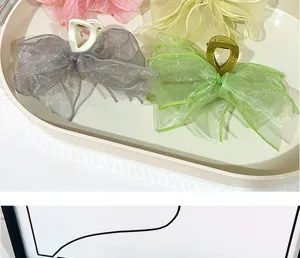 Elegante fermacapelli con fiocco in tulle, bellissimo accessorio colorato per ogni acconciatura.