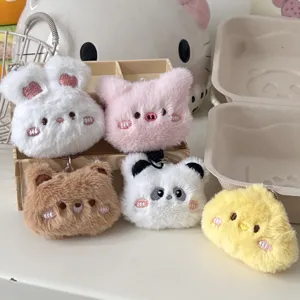 Cute plush animal keychain set featuring fluffy bunny, bear, and panda charms for bags.