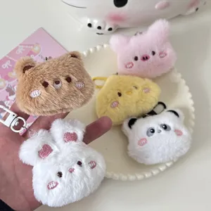 Cute plush animal keychain set featuring bear rabbit and panda charms, soft bag pendant accessory.