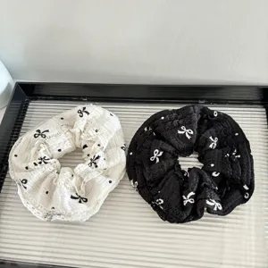 Fashion lace bow hair scrunchies set, black and white elastic hair ties for women daily styling.