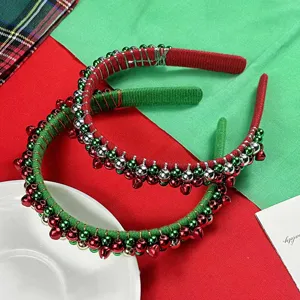 Close-up detail of Christmas flannel headbands wrapped with colorful jingle bells and beads.