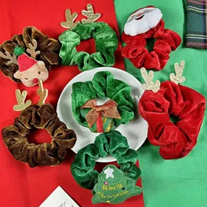 Set di elastici per capelli in velluto natalizio con simpatico Babbo Natale e renna.