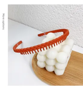 Matte oranje gevlochten haarband met tanden, antislip haarhoepel voor dames dagelijks.