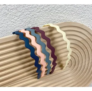Detailed view of colorful wavy plastic hair hoops, frosted non-slip design, daily hair accessory.