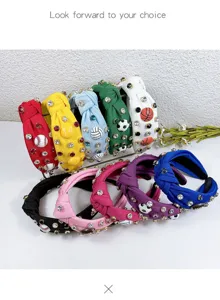 Detailed view of colorful fabric rhinestone headbands with sports ball charms, chic hair accessories.