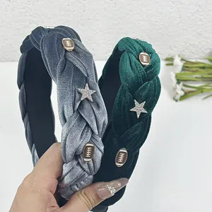 Velvet braided headband detail, rhinestone star and football metal studs, elegant hair accessory.