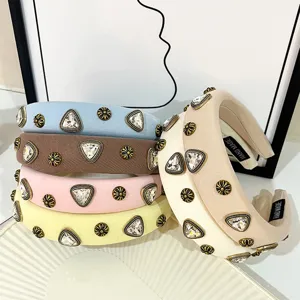 Fashion wide padded headband with sparkling rhinestones and vintage metal decor, 5 colors available.