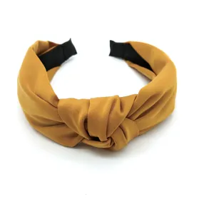Stylish yellow fabric knotted headband for women, wide hair hoop for daily fashion wear.