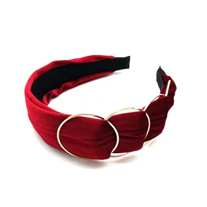 Red velvet hair hoop with metal ring decoration, stylish and versatile hair accessory for women.