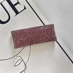 Sparkling purple rhinestone hair clip for women, elegant rectangle bobby pin hair accessory.
