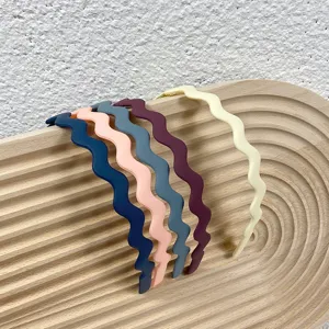 Matte wavy plastic headbands for women, anti-slip candy color hair hoops for daily wear.