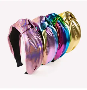 Metallic knotted headband for women, wide shiny hair hoop, colorful fashion hair accessories detail view.