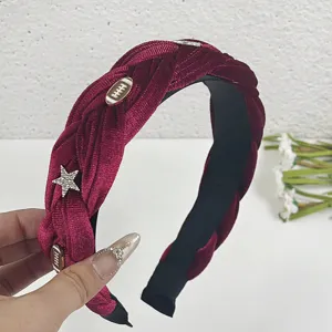 Burgundy velvet braided headband with rhinestone star and football charms for elegant hairstyles.
